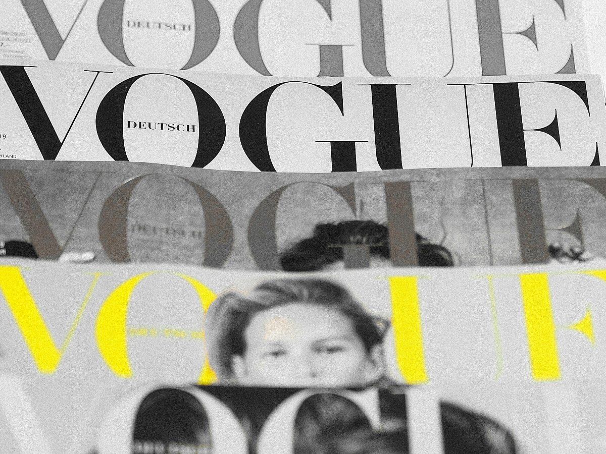 Vogue magazines on surface.