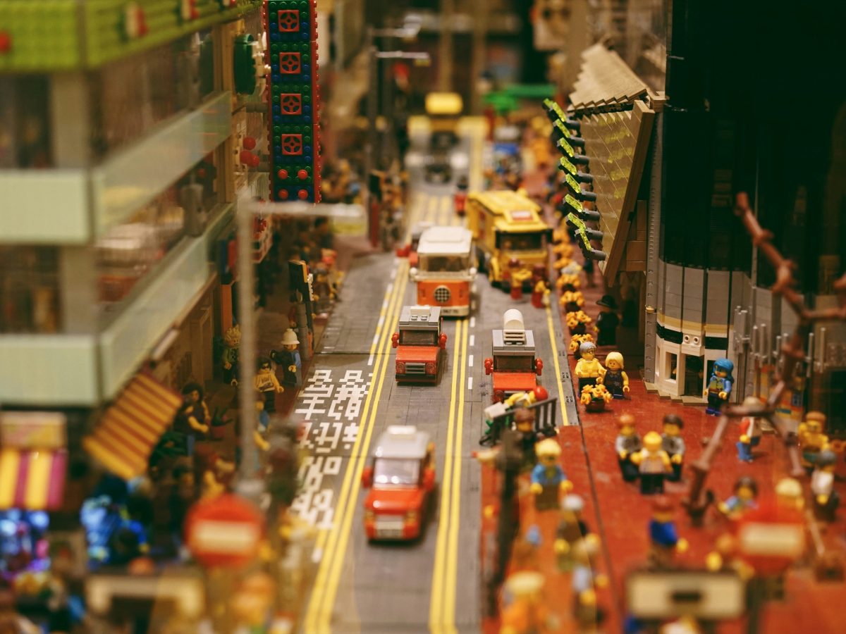 Close up shot a of a busy city street, built out of Lego bricks.