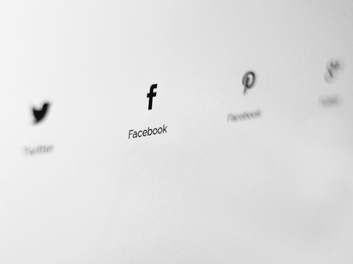 White screen displaying social media icons in black. Credit to NordWood themes.