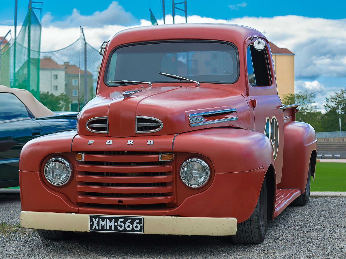 Parked Vintage Red Ford Utility Truck
