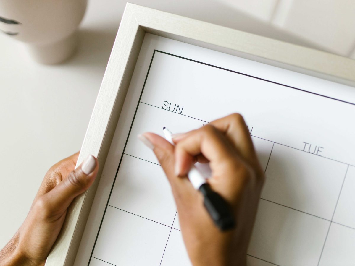 Hand writing on a calendar